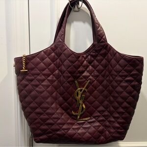 Authentic YSL maxi icare tote with removable zipped pouch.